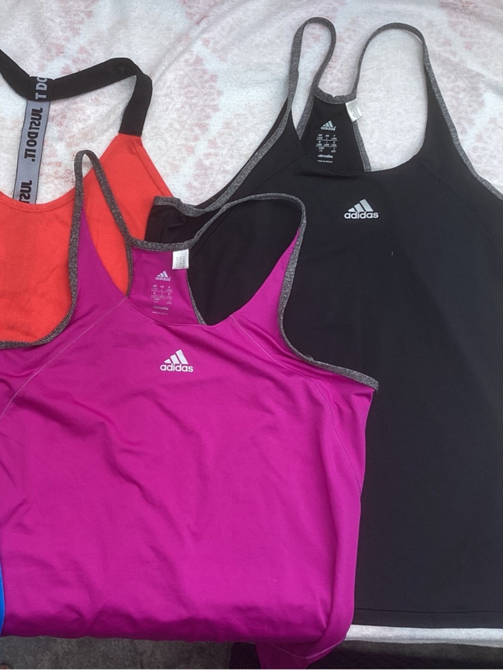 2 Adidas Racerback Tanks in Black, Fuchsia & Orange and  2 Nike blue and red
